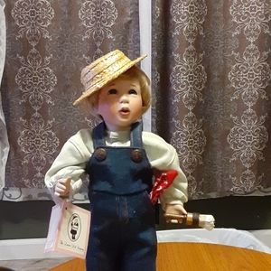 Porcelain artisan Tom Sawyer Doll.